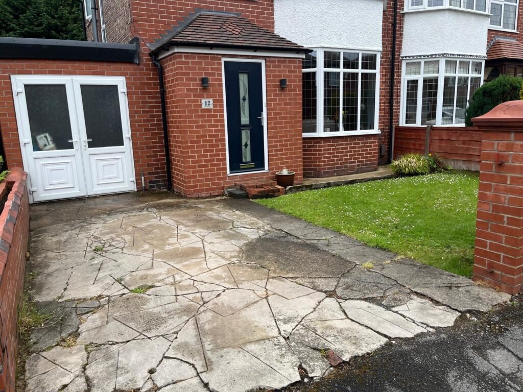 Ageing driveway and lawn before resin driveway installation in Sale
