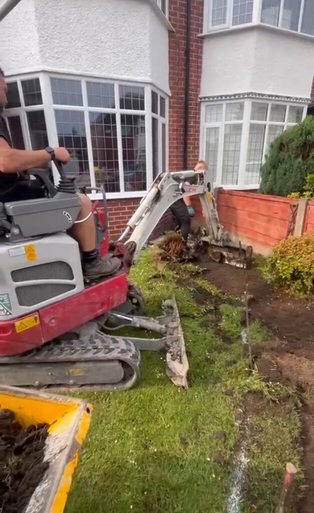 Excavating the old lawn for a new resin driveway in Sale