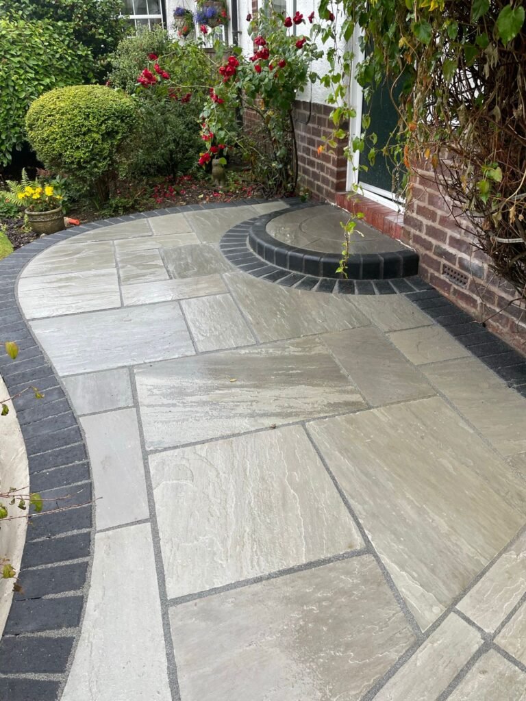 Grey Indian sandstone paving installed in Urmston by TLC